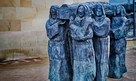 The Journey by Fenwick Lawson in Millennium Square, Durham, depicting the journey of Saint Cuthbert's body to Durham Cathedral.
