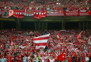 The Liverpool fans belt out You’ll Never Walk Alone at half-time.