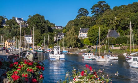Pont-Aven Brittany scene with Port Belon Ferry boat & sailing boats and houses on the banks of the River Aven Finistere department of Brittany France