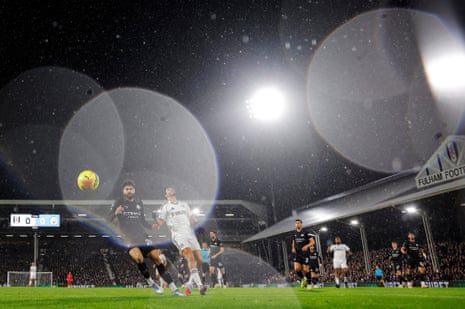 Heavy rain falls early in the first half of Fulham v Mancheter City as Josko Gvardiol of City and Raul Jimenez of Fulham chase the ball at Craven Cottage.