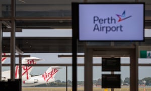 perth airport sign and planes in the background