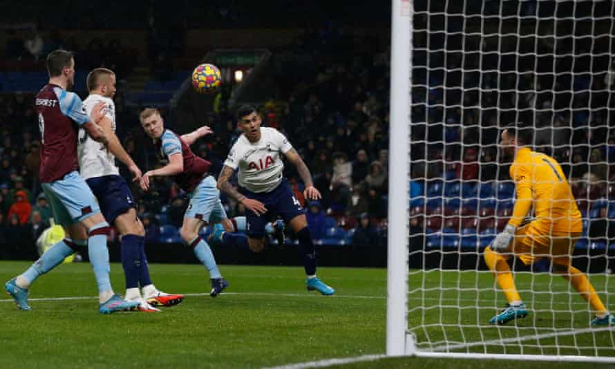 Burnley’s Ben Mee heads home against Tottenham.