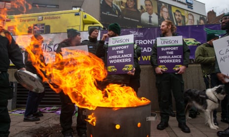 Ambulance workers on a picket line in London, 11 January 2023.