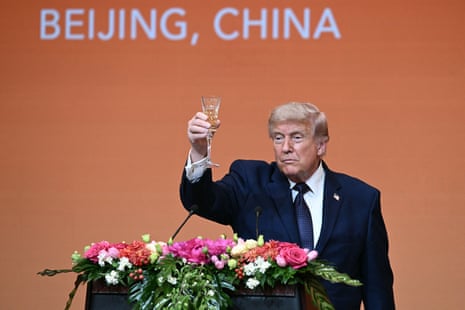 Donald Trump makes a toast at the state banquet with China's President Xi Jinping at the Great Hall of the People in Beijing.