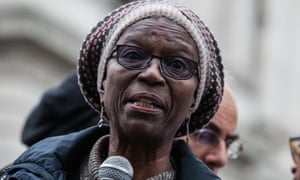 Ajibola Lewis, the mother of Olaseni Lewis, addresses campaigners after a procession to Downing Street.