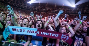 Iron Maiden fans at London’s O2 Arena show their support for West Ham.