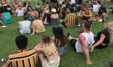 Several punters sport Cotton On’s Festival Shirt at the Fomo festival. Across Australia, hundreds of males have been rocking up to festivals in exactly the same shirt. 