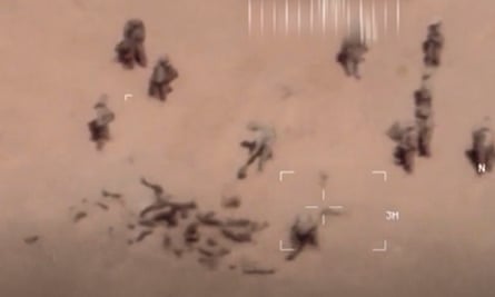 Video footage of soldiers burying bodies near an army base in northern Mali in April last year