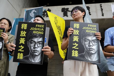 Hong Kong activist and supporters hold signs during a press event to support pro-democracy activist Joshua Wong in Taipei, Taiwan, Wednesday, 2 Sept., 2026.