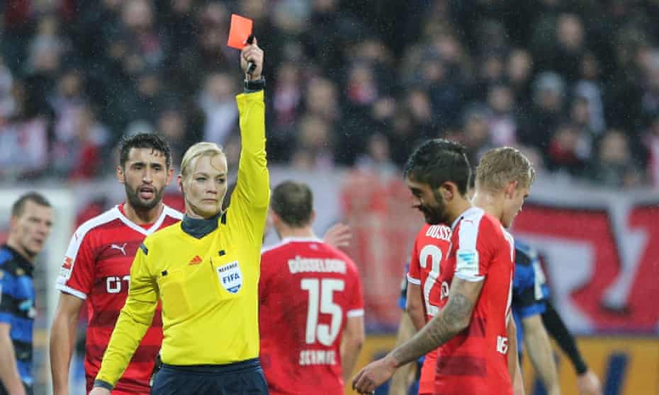 Bibiana Steinhaus shows a red card to Fortuna Dusseldorf’s Kerem Demirbay, right.