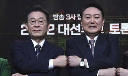 Presidential candidate Lee Jae-myung, left, of the ruling Democratic Party and Yoon Suk-Yeol of the main opposition People Power Party