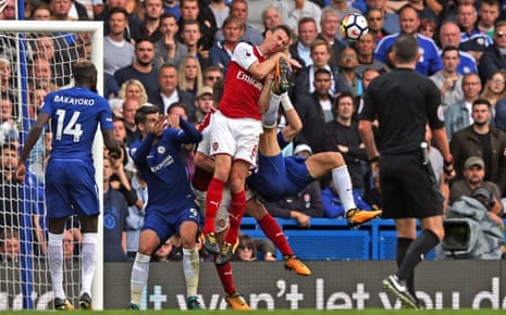 Koscielny gets a boot in the face, courtesy of Luiz.