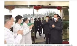 A screenshot from Weibo showing officials wearing specialised N95 respirator masks.