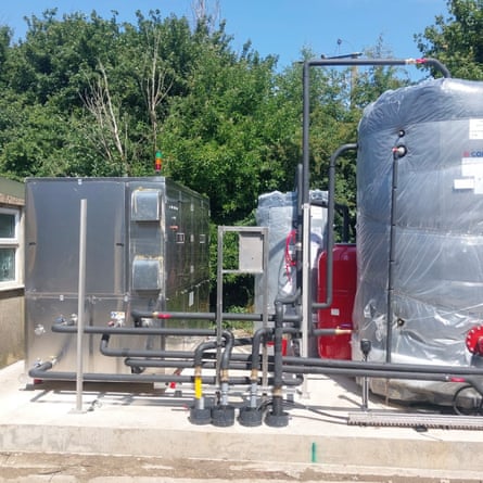 A milk-source heat pump, plus water tanks.