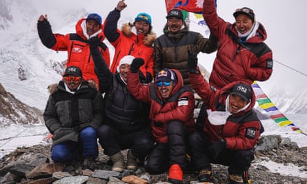 Purja, front row, second from right, and his team in 2021 before they were the first to reach the summit of K2 in winter, one of mountaineering’s most coveted feats.