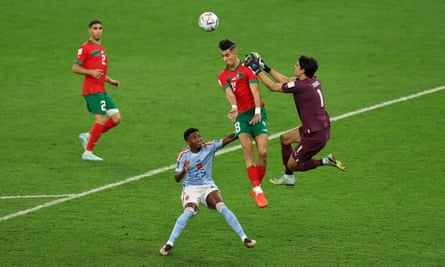 Morocco’s Jawad El Yamiq and keeper Yassine Bounou combine to thwart Spain’s Ansu Fati during their World Cup 2022 last-16 match, which Spain lost on penalties