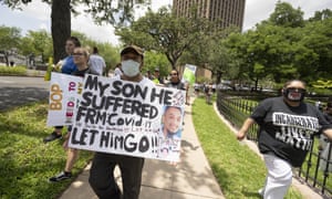 A coalition of Texas inmates rights groups rallies in May at the Texas governor’s mansion protesting against hazardous prison conditions regarding Covid-19.