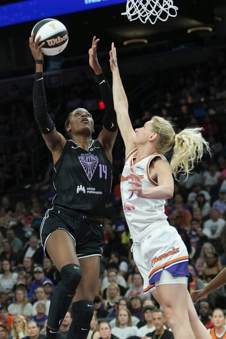 Temi Fágbénlé (left) in action for her new side Golden State Valkyries against the Phoenix Mercury guard Lexi Held.