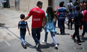Undocumented immigrant families walk from a bus depot to a respite center after being released from detention in McAllen, Texas. 3500.jpg?w=300&q=55&auto=format&usm=12&f