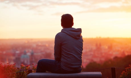 Man watching a sunrise