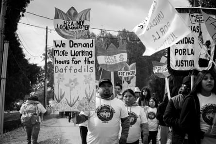 black-an-white photo of people holding signs in protest