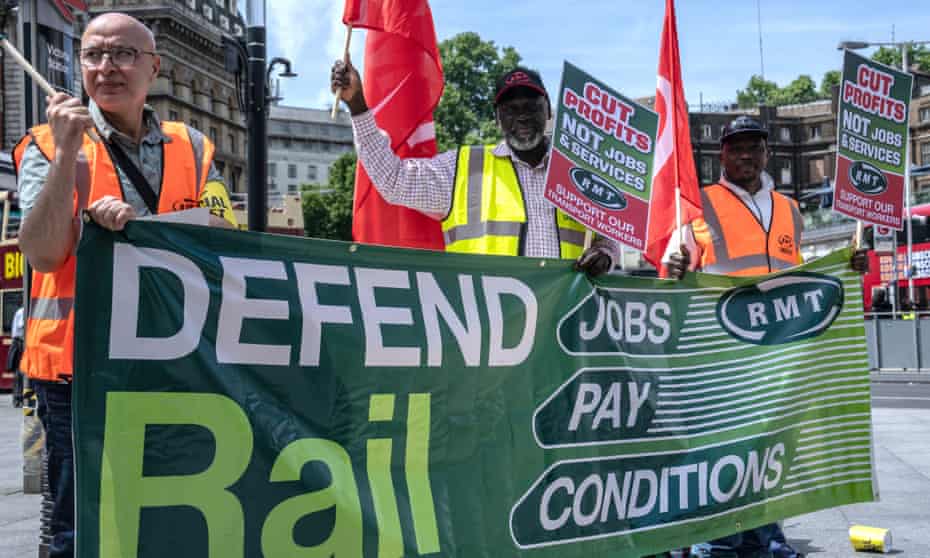 RMT union members picket outside Victoria train station