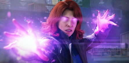 A red-haired woman with glowing eyes holds up glowing hands