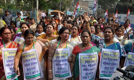 Women in Kolkata protest against the linking of the Aadhaar cards to free school lunches
