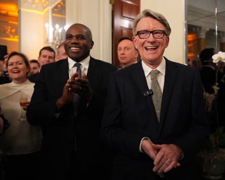 British ambassador to the United States Peter Mandelson reacts during a welcome reception for British prime minister Keir Starmer at the ambassador’s residence on 26 February 2025 in Washington DC. David Lammy stands to his right.