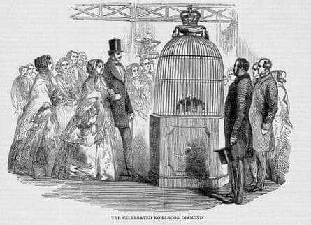 People looking at the Koh-i-noor diamond on display at the World’s Fair in London.