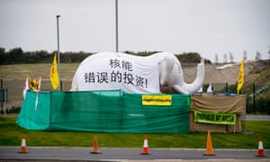 An inflatable elephant with a message addressed to the Chinese president, Xi Jinping, saying that Hinkley Point nuclear power station would be “a bad investment” for the Chinese state, is set up in an anti-nuclear campaign camp near the plant in Somerset. 
