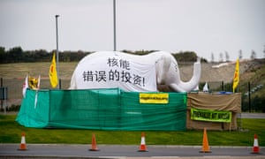 An inflatable elephant with a message addressed to the Chinese president, Xi Jinping, saying that Hinkley Point nuclear power station would be “a bad investment” for the Chinese state, is set up in an anti-nuclear campaign camp near the plant in Somerset.