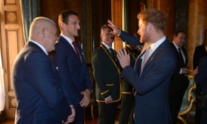 Prince Harry shows off some moves to the Wales captain, Sam Warburton. 