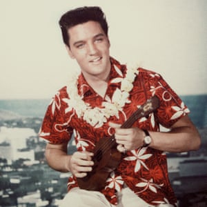 Success continued for Elvis with the release of Blue Hawaii in 1961. While the next few years would see him retreat from the spotlight while he made a glut of less acclaimed films, this photo shows him at the apex of his success, sporting a look which, albeit with some modernisation, lives on via Justin Bieberâs grubby glam and Gucciâs vivid designs.