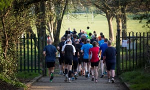 runners in a group in a park