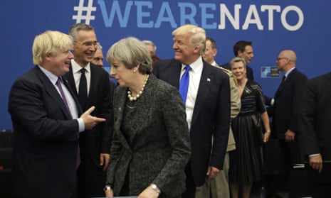 Boris Johnson, then foreign secretary (left), jokes with Donald Trump as Theresa May walks past during a Nato working dinner in May 2017