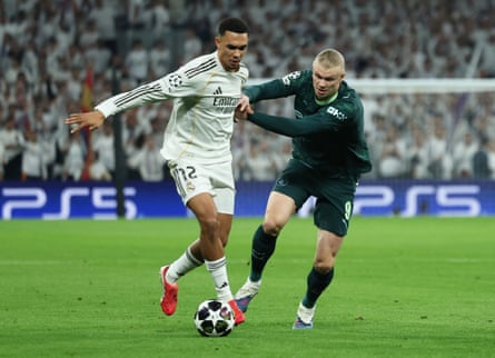 Trent Alexander-Arnold battles with Erling Haaland while playing for Real Madrid
