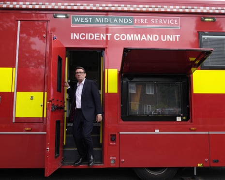Prime minister Andy Burnham leaves the West Midlands Fire Service incident command unit during a visit to Stourbridge in the West Midlands to discuss the response to wildfires across the region.