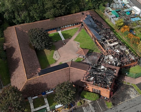 Aerial view of the burnt out buildings with the roofs destroyed