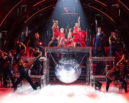 Professionals show dance - dancers on platform above a glitterball