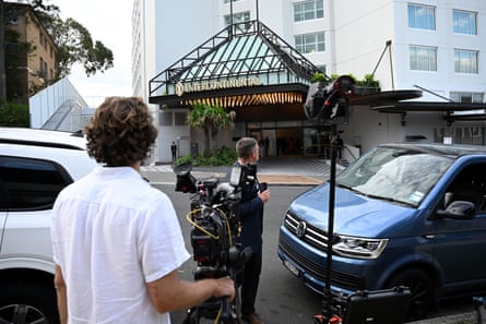 Media and onlookers gather outside the Intercontinental Hotel in Coogee
