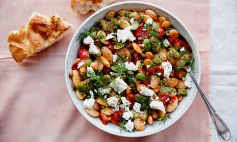 Anna Jones’s warm butter bean salad with green olives and tomatoes.