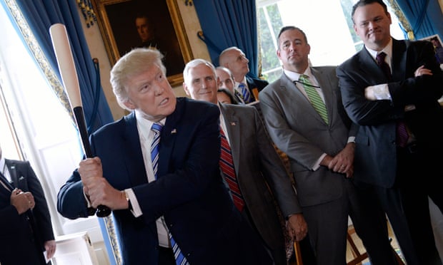 President Donald Trump swings a Marucci baseball bat in the Blue Room during a “Made in America” product showcase event at the White House in Washington, DC, on July 17, 2017. / AFP PHOTO / Olivier DoulieryOLIVIER DOULIERY/AFP/Getty Images