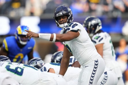 Seattle Seahawks quarterback Geno Smith calls a play during the first half of Sunday’s game against the Los Angeles Rams.