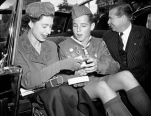 Eagle Scout John Rowsey of Arlington, Virginia, sits beside the Queen in Washington DC on 19 October 1957