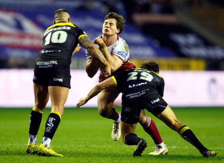 Ethan Havard is tackled by York’s Paul Vaughan (left) and Sam Cook during their competitive contest