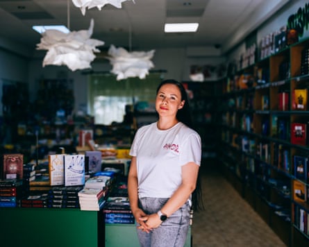 Maryna Medvedeva posing for a portrait in Alpaca bookshop