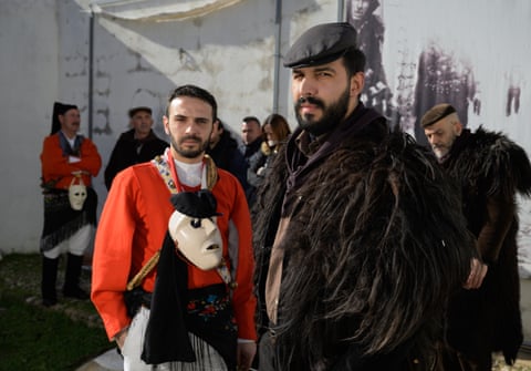 A portrait of two men in Sardinian costume