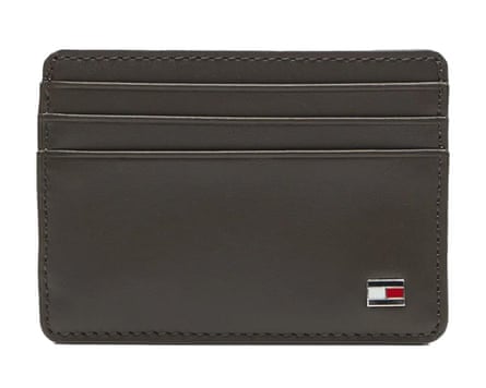 A three pocket leather card holder with an enamel Tommy Hilfiger flag logo in the bottom right corner. It is on a white background.