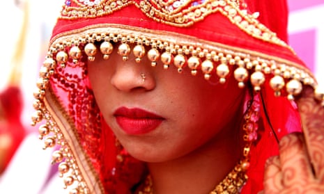 An Indian bride takes part in a mass marriage ceremony on the occasion of the Akshaya Tritiya festival in Bhopal, India.